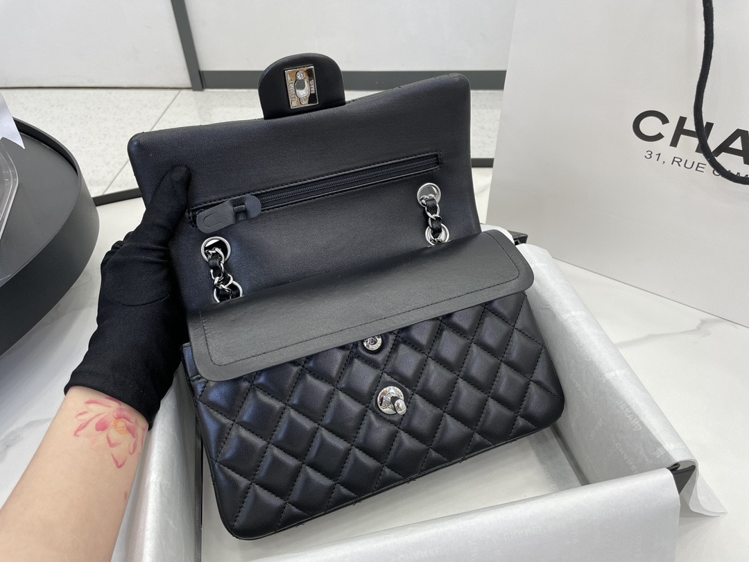 Ch*el small classic handbag grained shiny calfskin & silver-tone metal black 5.7 × 9 × 2.3 in