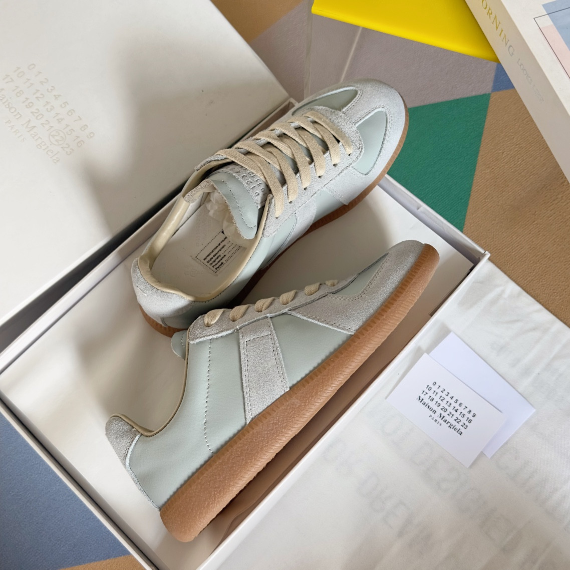 ua ma*s*n Ma*i*la mm6 sneakers