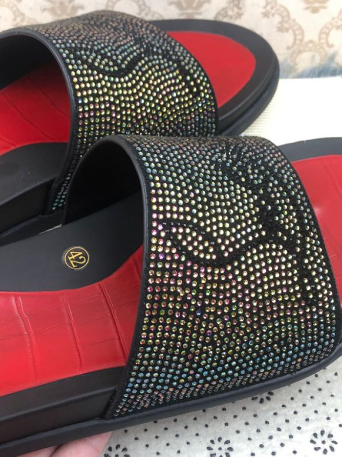 CHRISTIAN LOUBOUTIN SLIPPERS