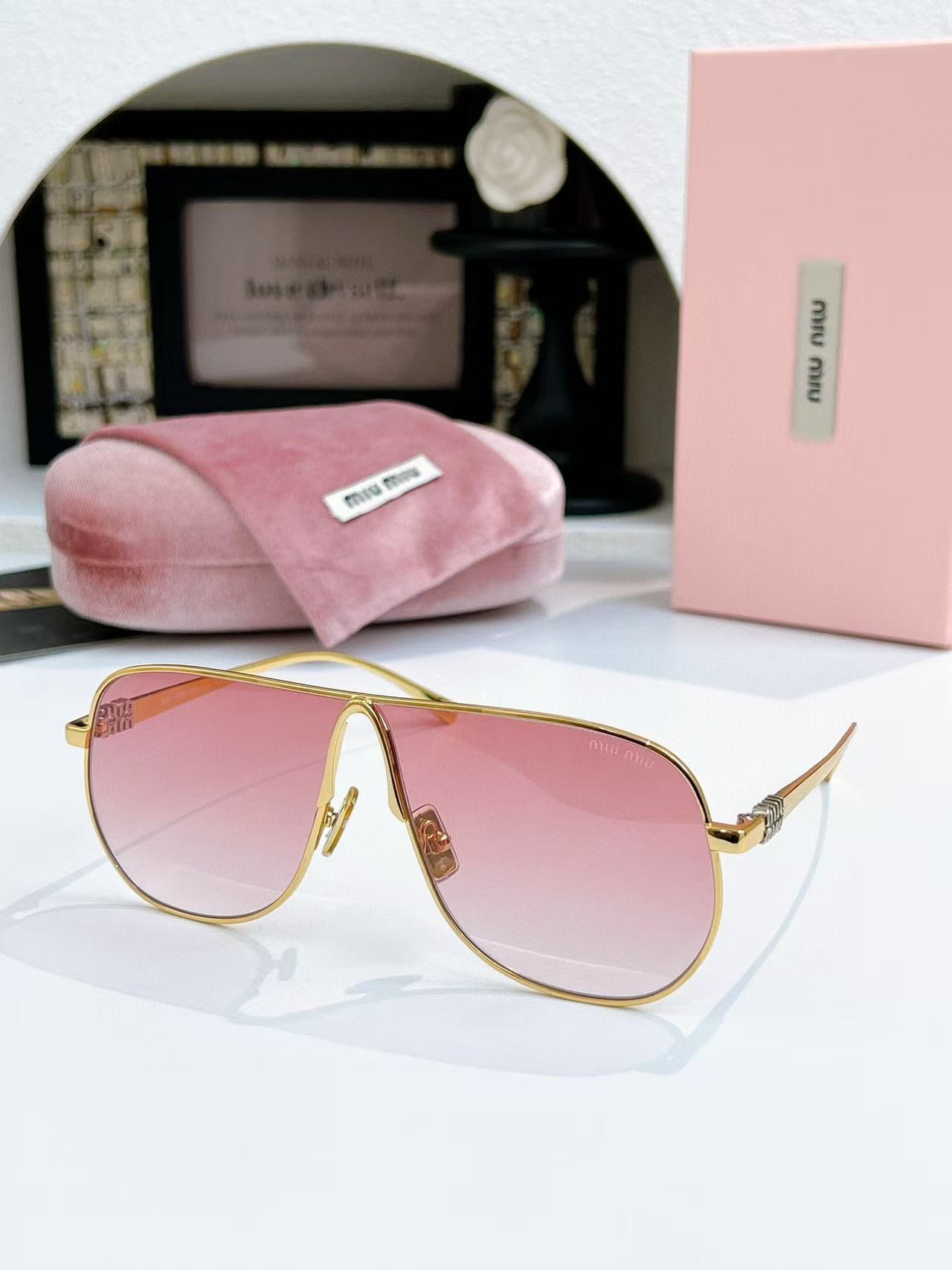 Miu Miu Glasses SMUA56