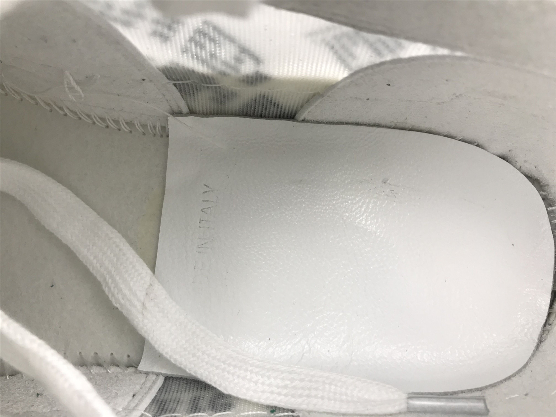 ua D10r b23 low top daniel asham newspaper