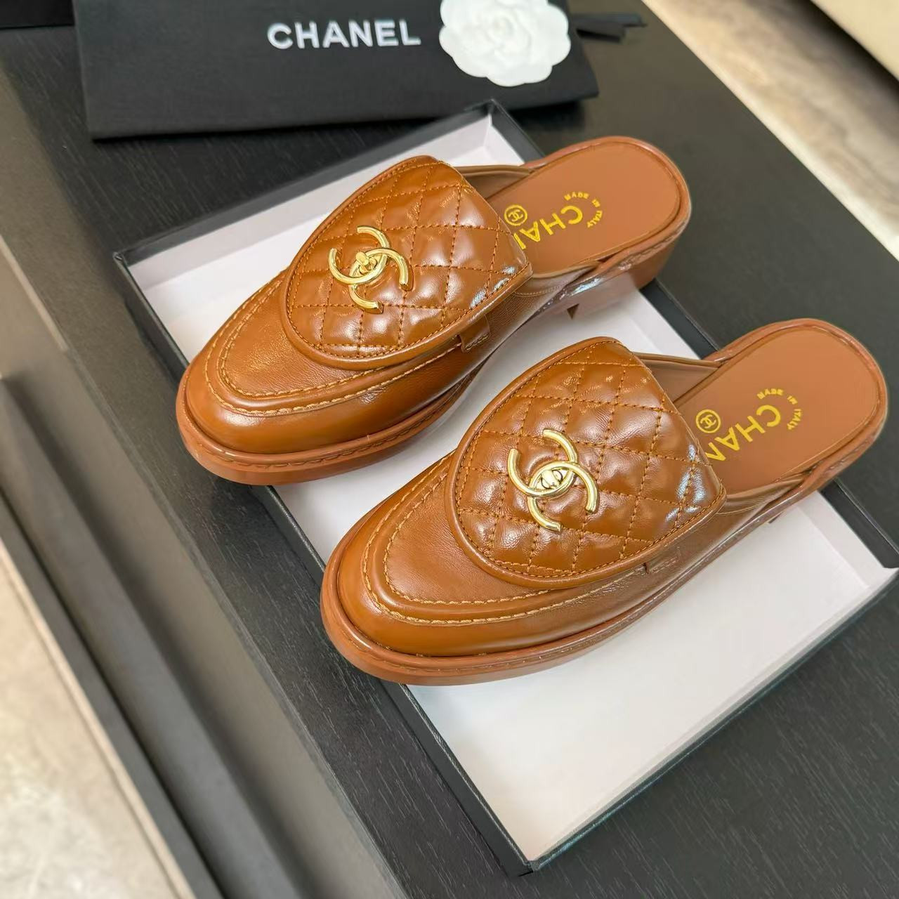 UA Ch**el Slides Leather Flats