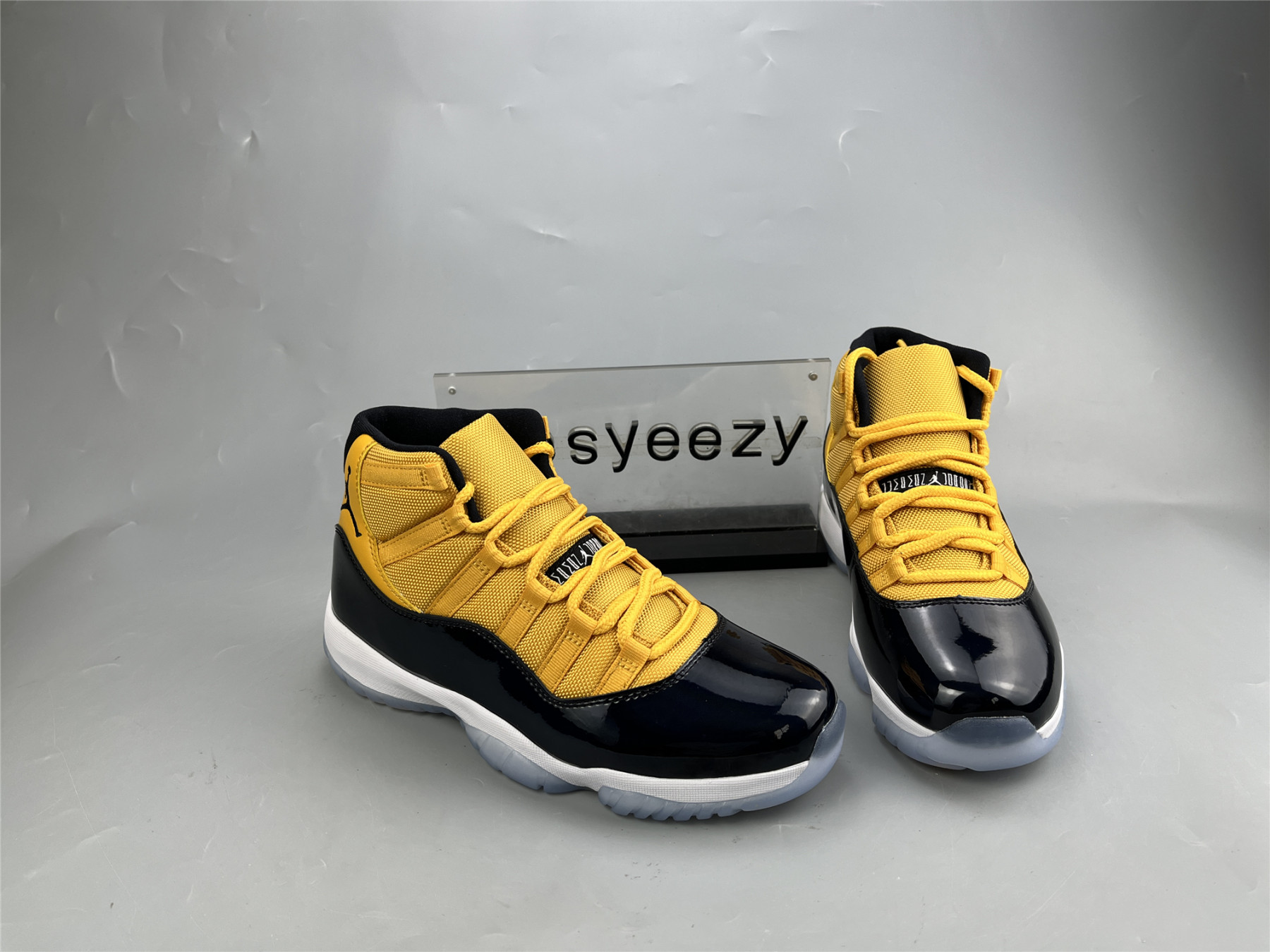 UA AIR JORDAN 11 RETRO BLACK YELLOW