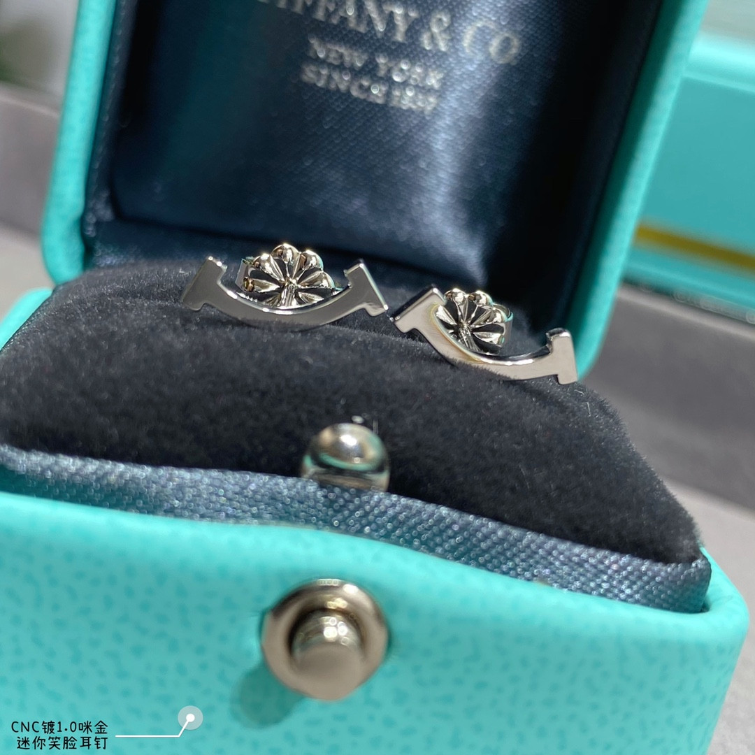Tiffany & Co. Mini Smile Smooth Stud Earrings