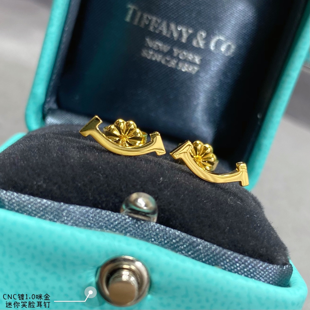 Tiffany & Co. Mini Smile Smooth Stud Earrings