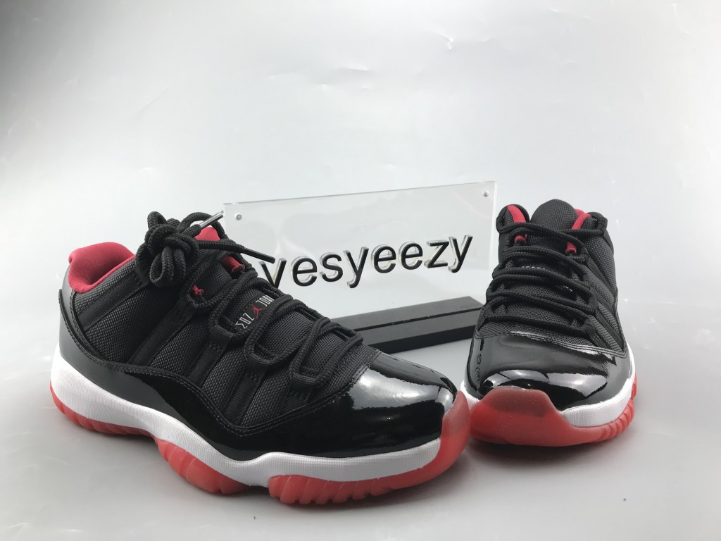 UA AIR JORDAN 11 RETRO LOW BRED
