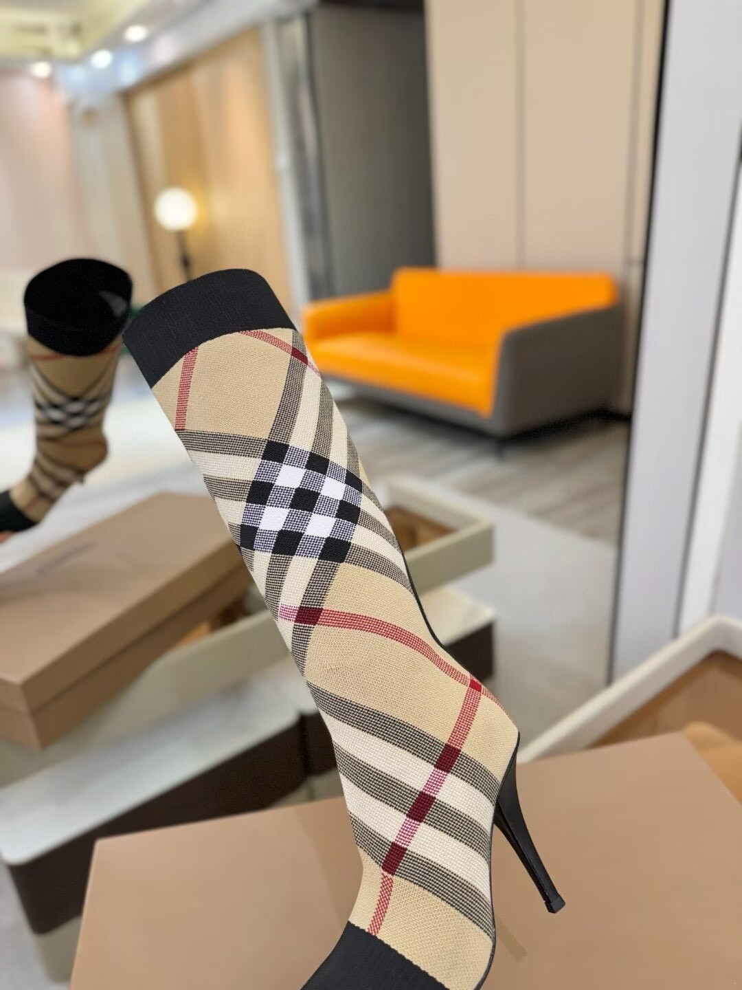 ua Bv*b*rry check high boots