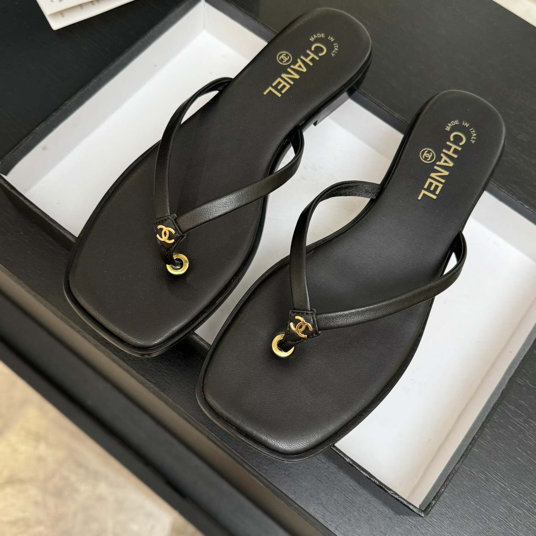 UA Ch**el Times Square Thong Sandals