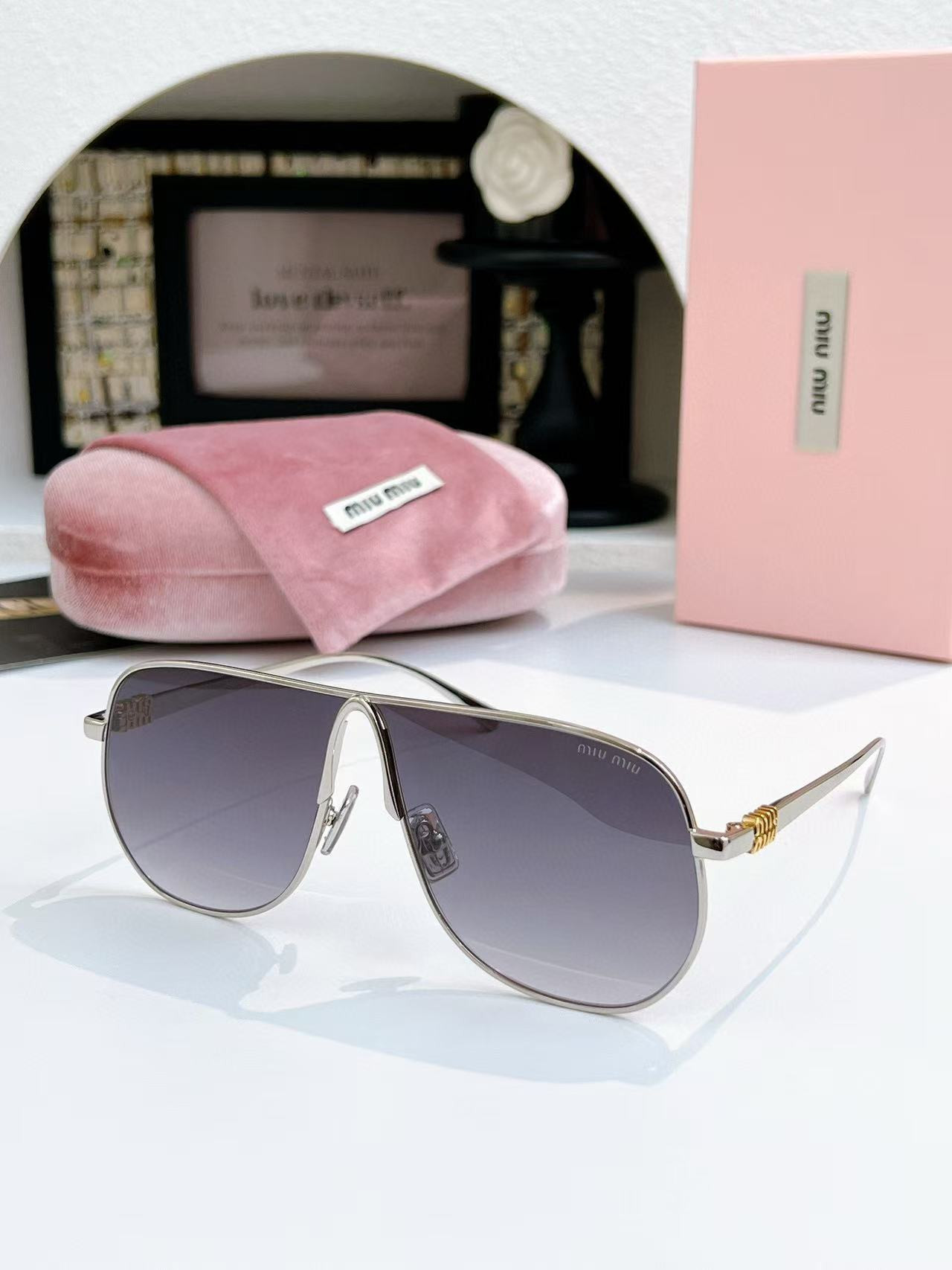 Miu Miu Glasses SMUA56