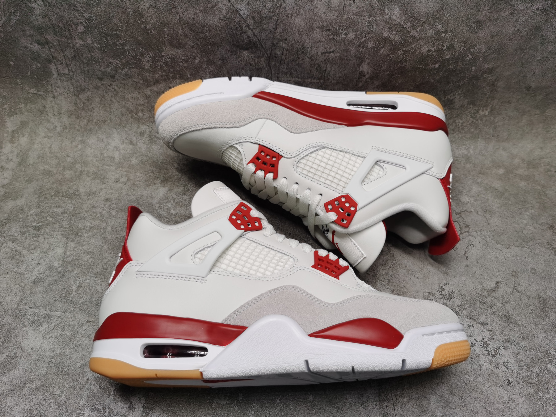 UA Jordan 4 Retro SB