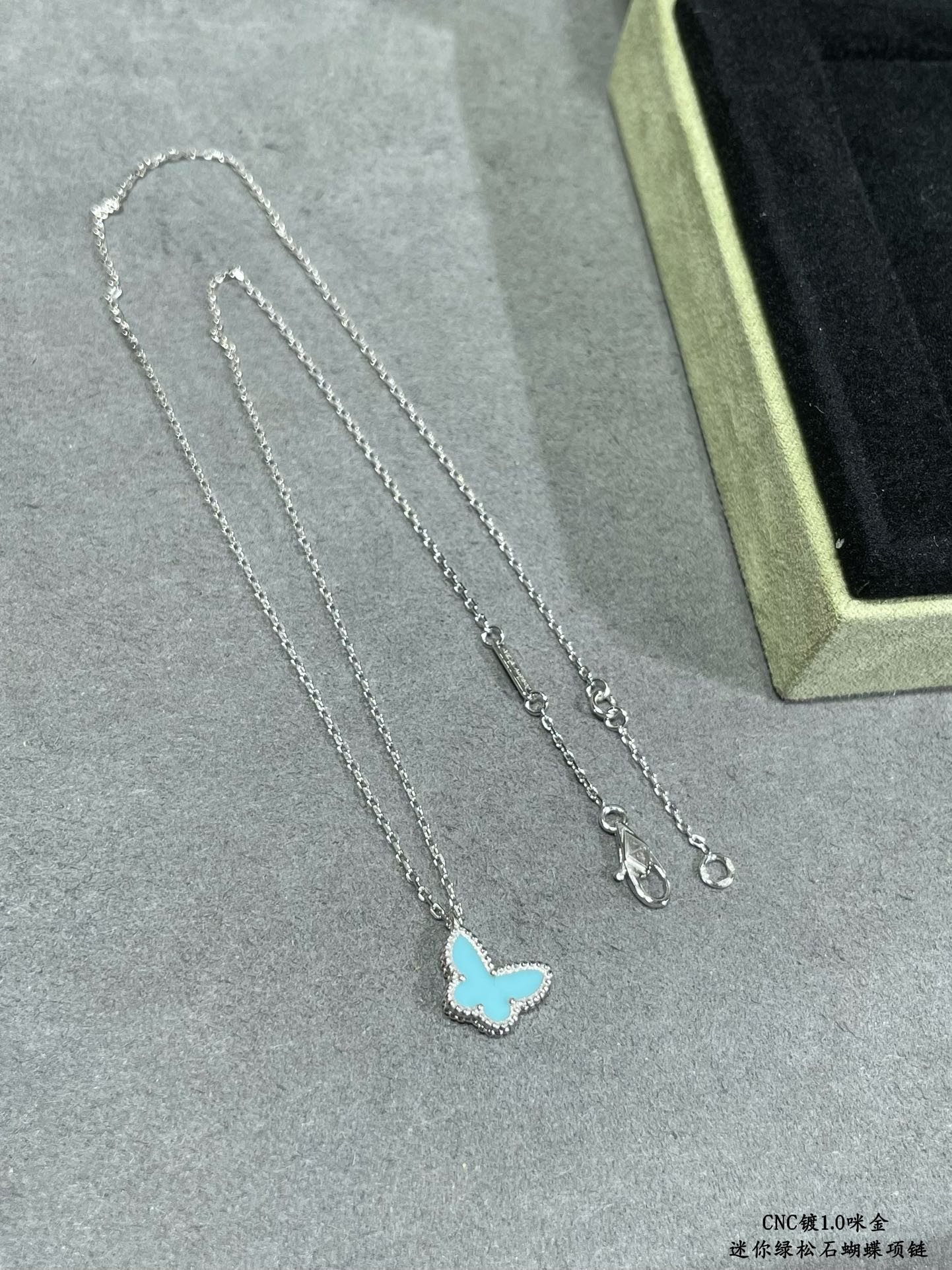V*n Cl**f & Arpels Turquoise Mini Butterfly Necklace