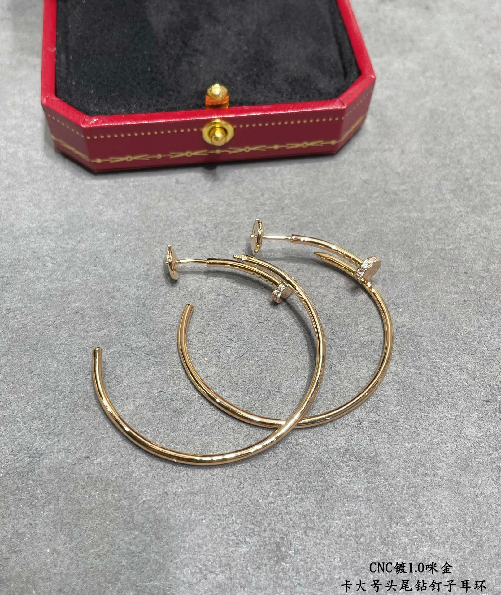 Ca*t1er Large size head and tail D1am0nd nail Earrings