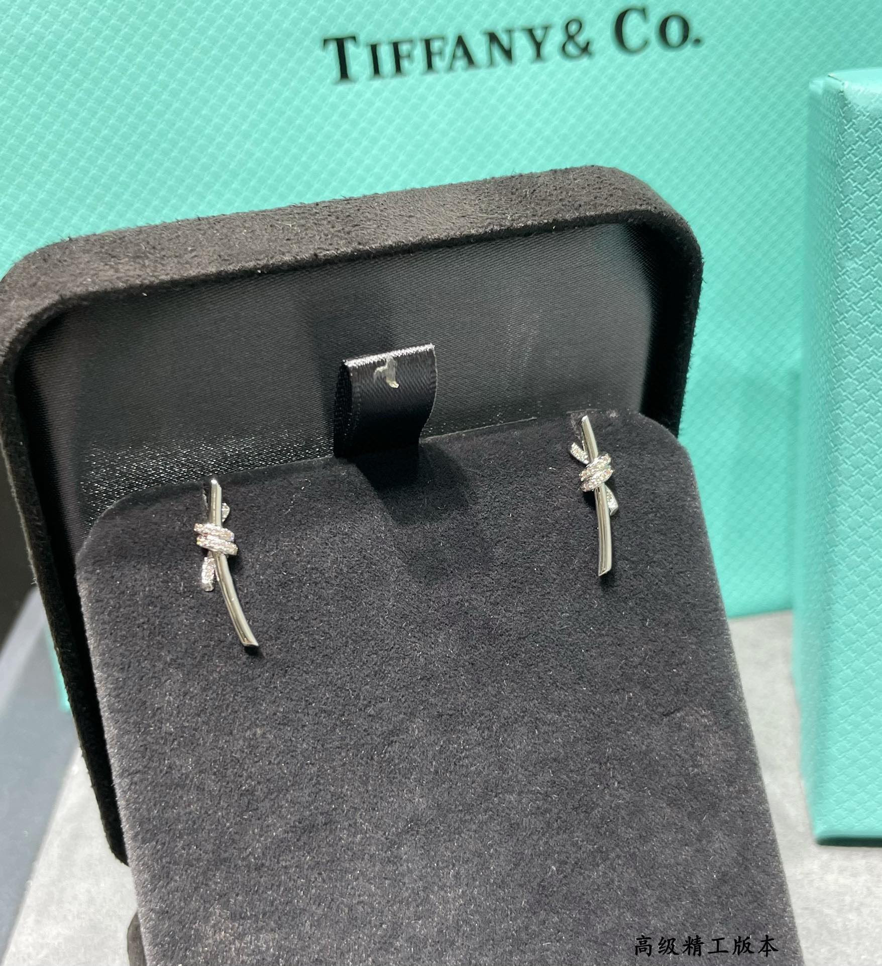 T*f*ny & Co. Half-D1am0nd T Wire Knot Stud Earrings