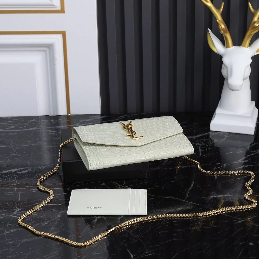 YSL UPTOWN CHAIN WALLET IN CROCODILE-EMBOSSED SHINY LEATHER 7.5 X 4.7 X 1.2 INCHES