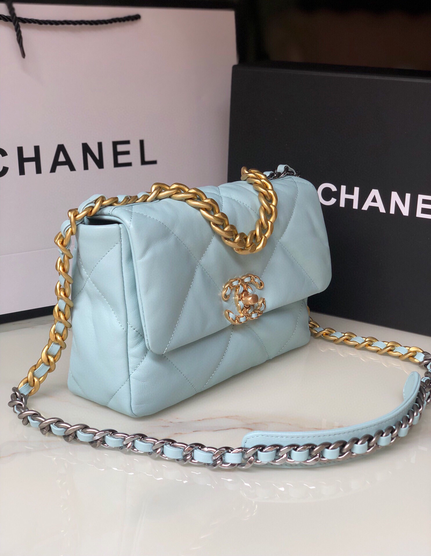 Ch**el 19 HANDBAG Shiny Leather, Gold-Tone, Silver-Tone & Ruthenium-Finish Metal Light Blue 6.2 × 10.1 × 3.5 in