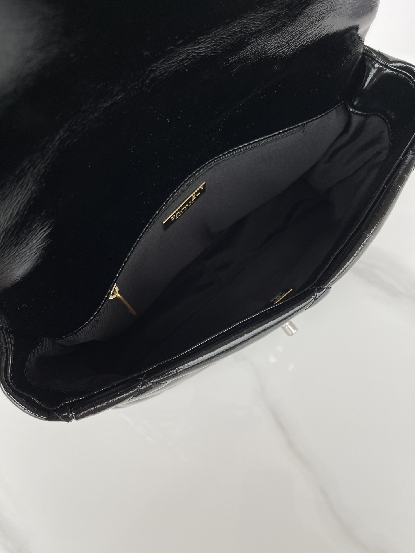 Ch**el 19 LARGE HANDBAG Shiny Leather, Gold-Tone, Silver-Tone & Ruthenium-Finish Metal Black 7.8 × 11.7 × 3.9 in