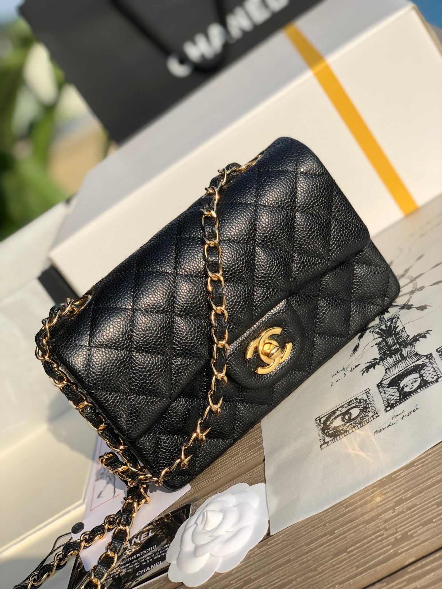 Ch**el MINI FLAP BAG BLACK WITH GOLD-TONE MENTAL 4.7 × 7.8 × 2.3 in