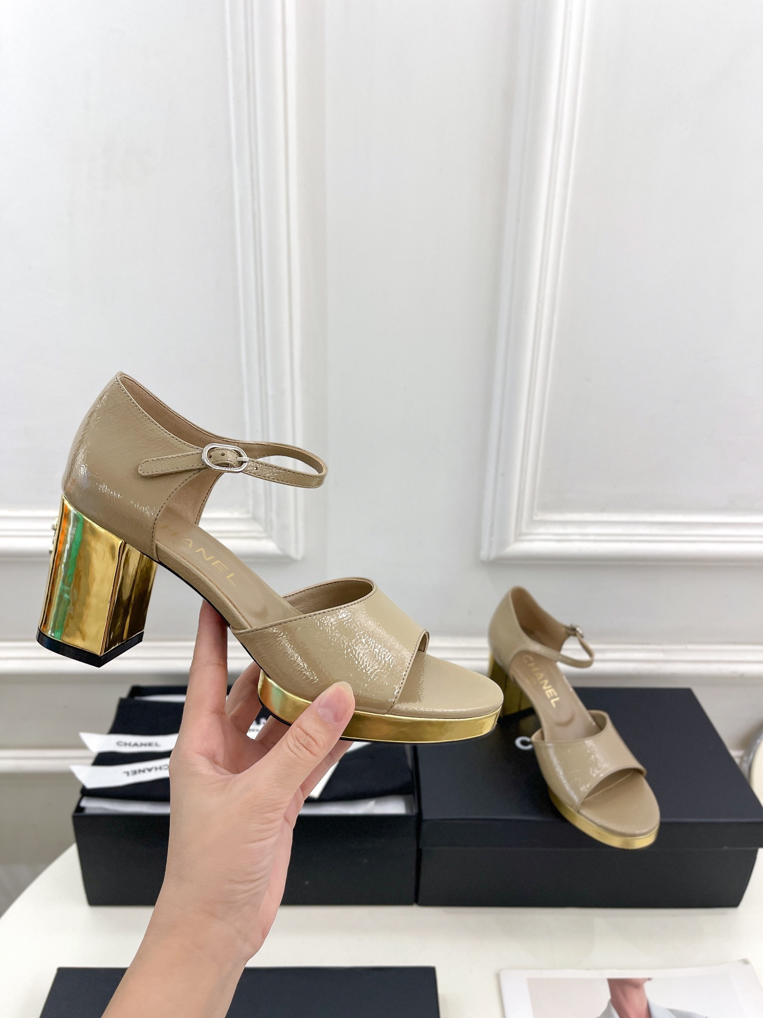 UA Ch**el HEELED SANDALS