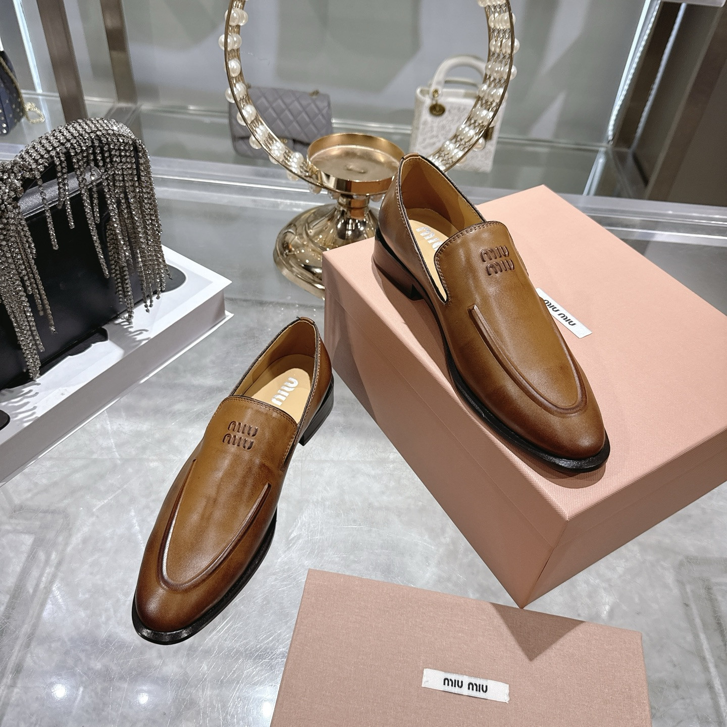 UA Miu Miu Leather Loafers