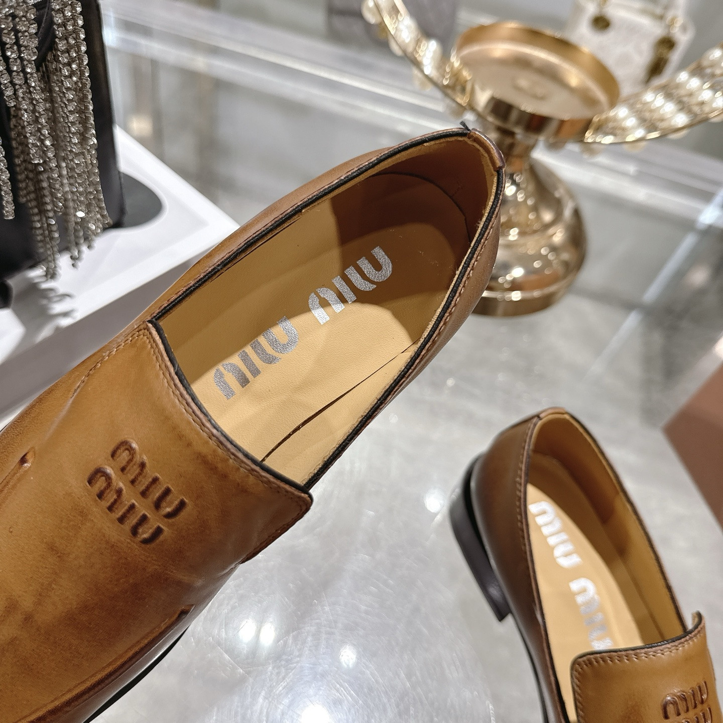 UA Miu Miu Leather Loafers