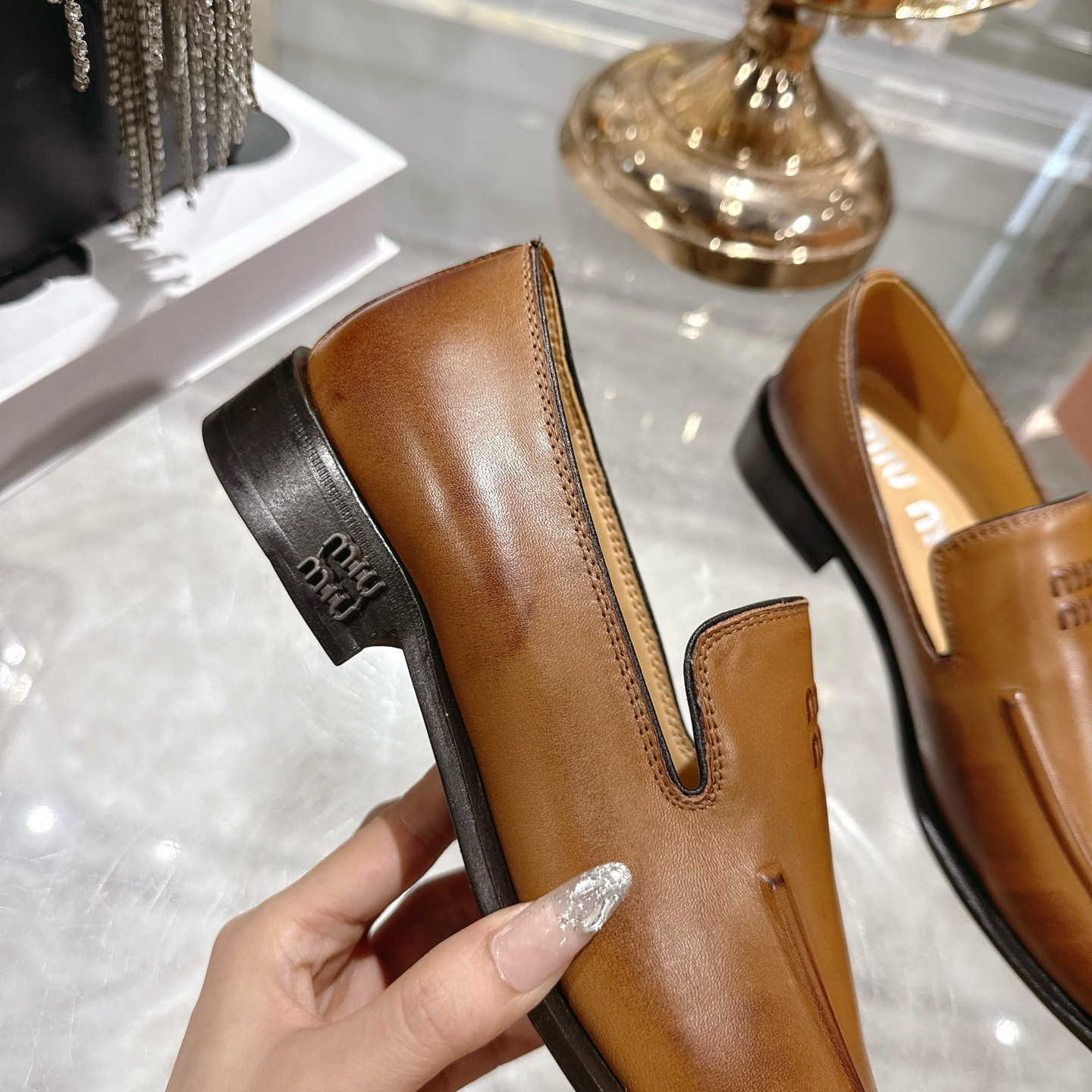 UA Miu Miu Leather Loafers