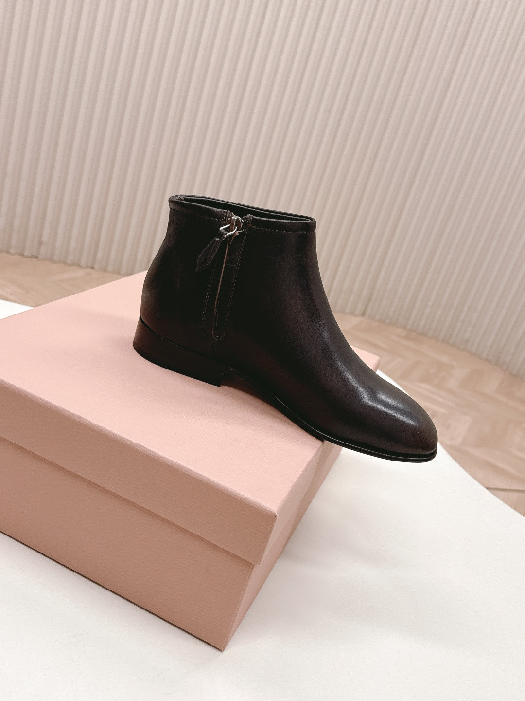 UA Miu Miu Fumé Leather Booties
