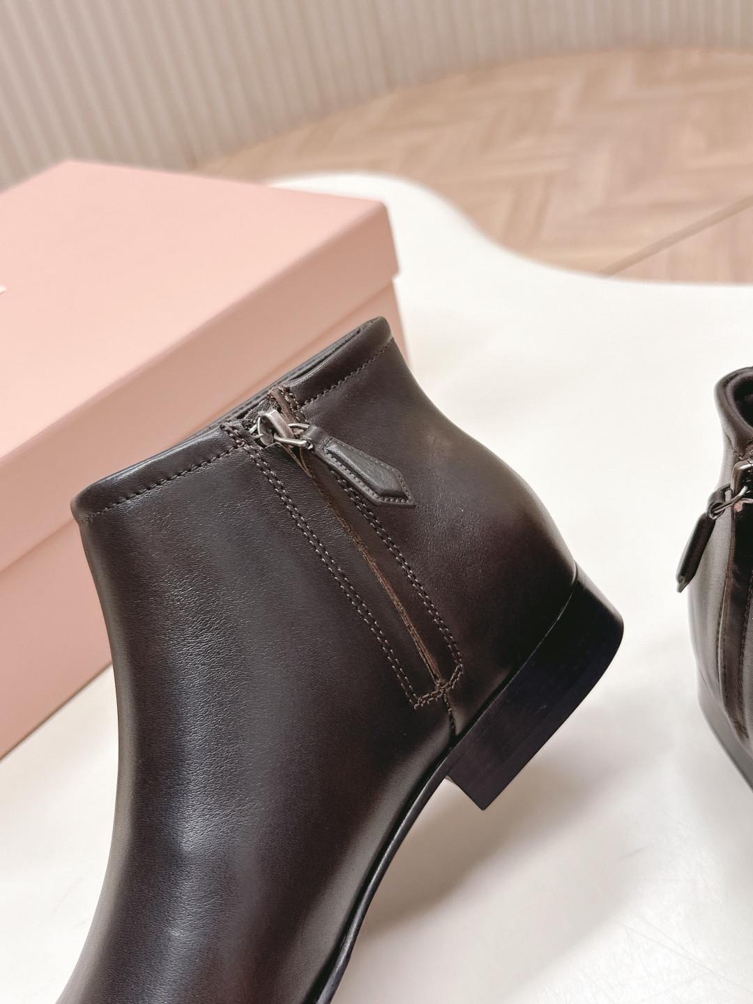 UA Miu Miu Fumé Leather Booties
